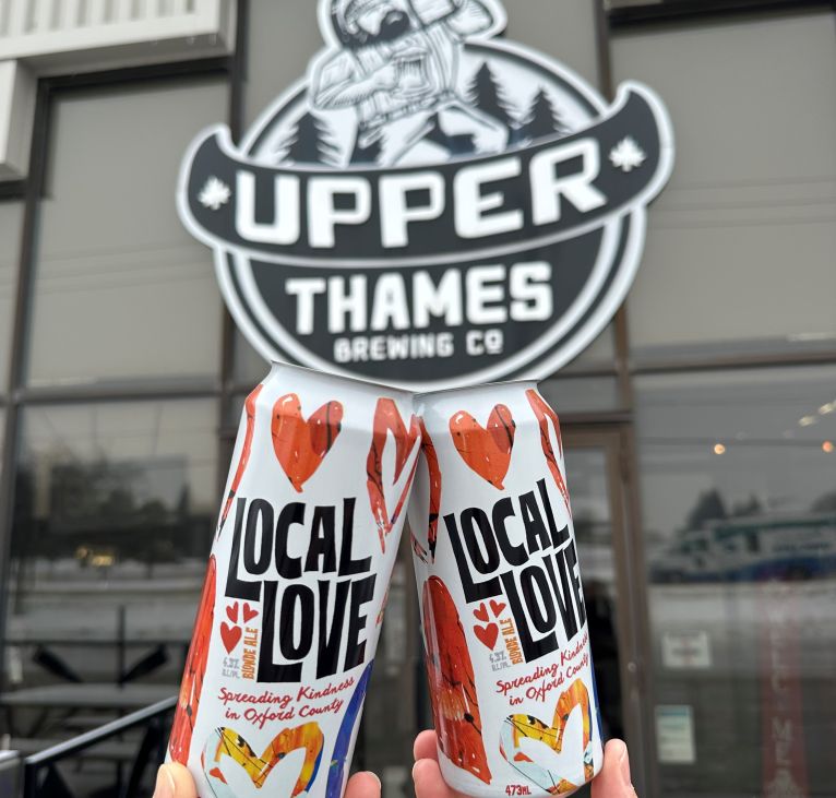 Two Local Love Beers in front of Upper Thames Brewing co.