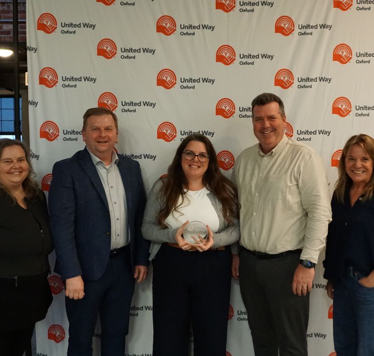 Group of employees from Woodstock Hospital accepting their award